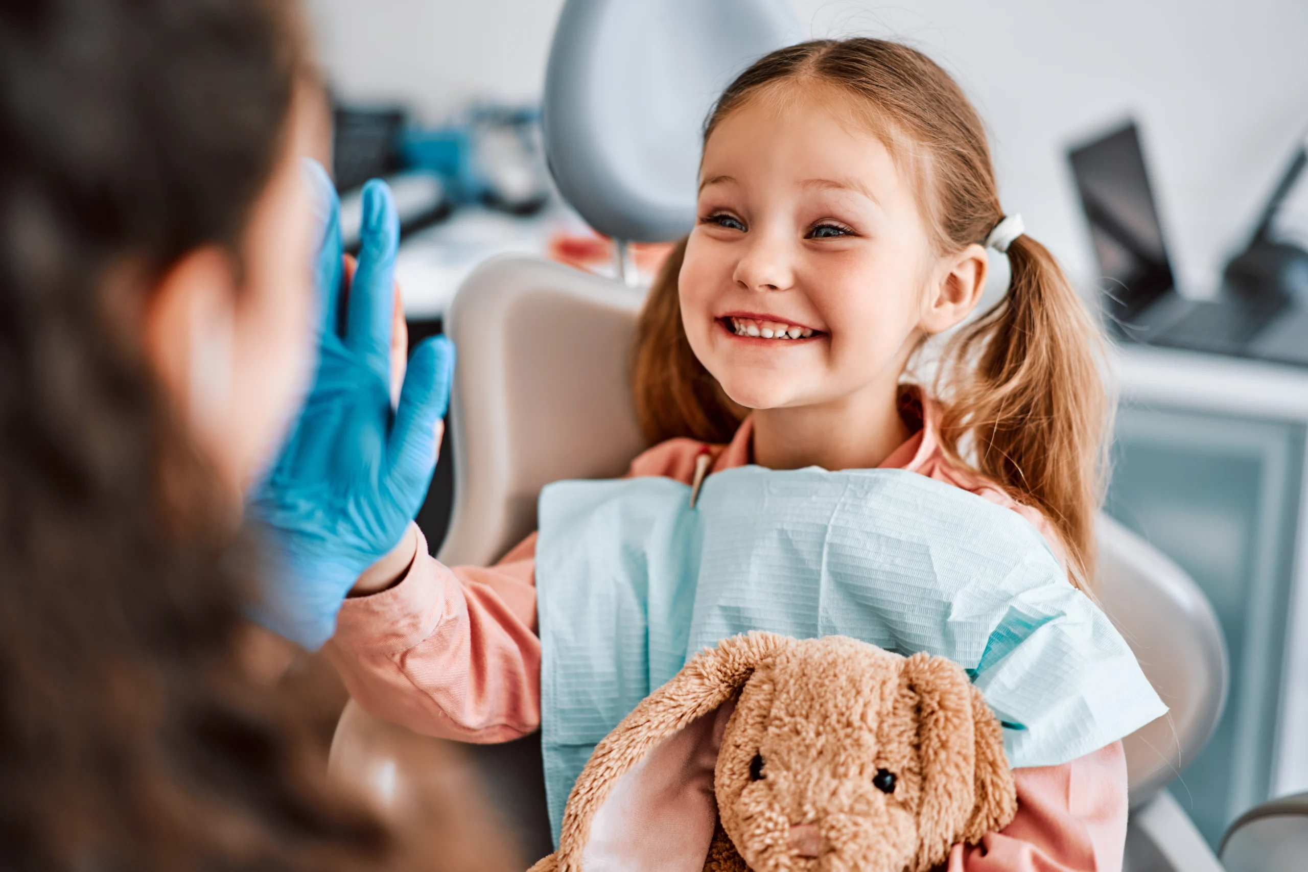 A child smiling at the children's dentist at North Harrow Dental in Harrow